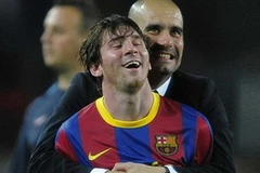 Thầy trò Guardiola-Messi ngất ngây. (Nguồn: Getty Images)