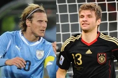 Diego Forlan và Thomas Mueller. (Nguồn: Getty Images)