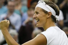 Kirsten Flipkens hân hoan sau khi loại Kvitova. (Nguồn: AP)