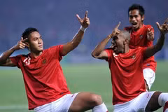 Cổ động viên trên khán đài sân Bung Karno. (Ảnh: Quốc Khánh/TTXVN)
