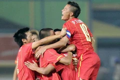 Niềm vui của U23 sau bàn gỡ hòa. (Ảnh: Quốc Khánh/TTXVN)