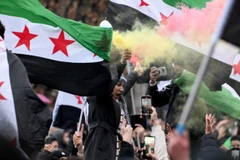 Người Syria ở Berlin ăn mừng sự sụp đổ của Tổng thống Bashar al-Assad. (Nguồn: AFP/France 24)