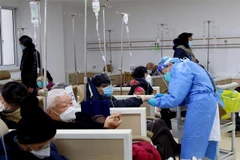 Trung Quốc điều chỉnh tiêu chuẩn chẩn đoán và điều trị COVID-19