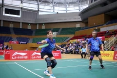 Trận đấu đôi nam nữ tại vòng loại. (Ảnh: Trần Lê Lâm/TTXVN)