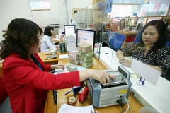 "Đáp ứng đủ nhu cầu tiền mặt trong dịp Tết Giáp Ngọ"