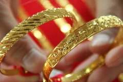 Giá vàng tại châu Á giữ ở mức thấp trong một tháng qua