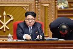 Nhà lãnh đạo Kim Jong Un (giữa) tại lễ bế mạc Đại hội Đảng Lao động Triều Tiên lần thứ VII ở Bình Nhưỡng ngày 9/5. Kyodo/TTXVN