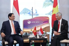 Thủ tướng Phạm Minh Chính gặp Thủ tướng Singapore Lý Hiển Long