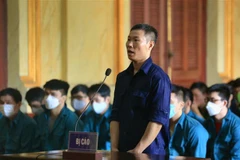 Bị cáo chủ mưu Hoàng Duy Tiến, cựu cán bộ Phòng Cảnh sát Kinh tế, Công an Thành phố Hồ Chí Minh. (Ảnh: Thành Chung/TTXVN)