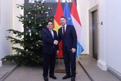 Thủ tướng Chính phủ Phạm Minh Chính và Thủ tướng Luxembourg Xavier Bettel. (Ảnh: Dương Giang/TTXVN)