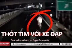 Thót tim với xe đạp liều lĩnh đi trên cao tốc suýt bị ôtô đâm