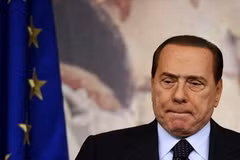 Việc Thủ tướng Italy Berlusconi phải từ chức là điều bắt buộc phải đến (Nguồn: AFP/TTXVN)