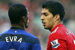 Luis Suarez và Patrice Evra hy vọng sẽ làm hòa ở trận đấu tại Anfield tối mai (Nguồn: Getty Images)