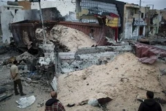 Một địa điểm ở Tripoli tan hoan do trúng rocket của NATO (Nguồn: AP)