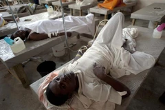 Bệnh nhân mắc bệnh tả được điều trj tại bệnh viện ở Port-au-Prince, Haiti. (Ảnh: AFP/TTXVN)