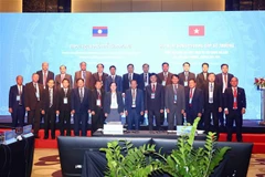 Các đại biểu Bộ Công an hai nước tham dự hội nghị. (Ảnh: Phạm Kiên/TTXVN)