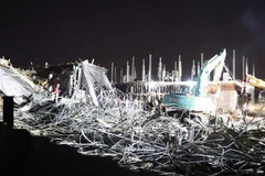 Hiện trường vụ sập giàn giáo. (Ảnh: Hoàng Ngọc/TTXVN)