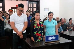 Các bị cáo tại phiên tòa. (Ảnh: Nguyễn Hoàng/TTXVN)