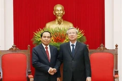 Thường trực Ban Bí thư Bounthong Chitmani tiếp ông Bounthong Chitmani, Phó Thủ tướng Chính phủ, Trưởng Ban Kiểm tra Trung ương, Tổng Thanh tra Chính phủ, Trưởng Ban phòng, chống tham nhũng Trung ương Lào. (Ảnh: Phương Hoa/TTXVN)