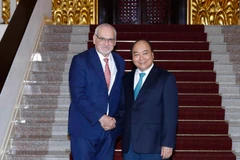 Thủ tướng Nguyễn Xuân Phúc tiếp ông Philippe Le Houérou, Tổng Giám đốc điều hành Tổ chức Tài chính quốc tế (IFC). (Ảnh: Thống Nhất/TTXVN)