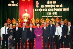 Chủ tịch Quốc hội Nguyễn Thị Kim Ngân với các đại biểu tại Lễ kỷ niệm. (Ảnh: Trọng Đức/TTXVN)