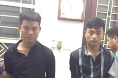 Hai đối tượng Ly Seo Chư và Cư Seo Nhà. (Ảnh: TTXVN)