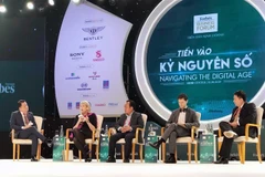Phiên thảo luận Cưỡi trên ngọn sóng số trong khuôn khổ Diễn đàn. (Ảnh: Mỹ Phương/TTXVN)