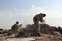 Các lực lượng Syria tại khu vực Sawwan, phía Nam Khanasser. (Nguồn: AFP/TTXVN)