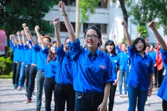 Hô vang khẩu hiệu quyết tâm vì một 'Mùa hè xanh' thành công rực rỡ. (Ảnh: Minh Sơn/Vietnam+) 