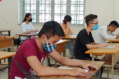 Thí sinh dự thi tốt nghiệp Trung học phổ thông. (Ảnh: Phạm Mai/Vietnam+)