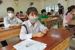 Thí sinh dự thi tốt nghiệp THPT. (Ảnh: Phạm Mai/Vietnam+)