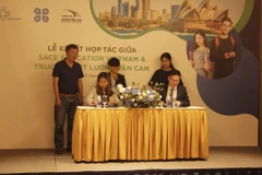 Đại diện các bên ký kết hợp tác. (Ảnh: PV/Vietnam+)