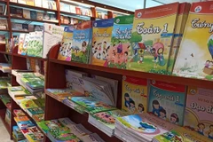 Sách giáo khoa lớp 1 mới được sử dụng trong các nhà trường từ năm học 2020-2021 theo chương trình giáo dục phổ thông mới. (Ảnh: Phạm Mai/Vietnam+)