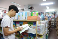 Sách giáo khoa mới sẽ được áp dụng trong các nhà trường từ năm học 2020-2021. (Ảnh: PM/Vietnam+)