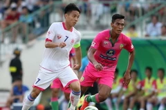Hà Nội (áo trắng) thắng Đồng Tháp. (Nguồn: BBĐ)