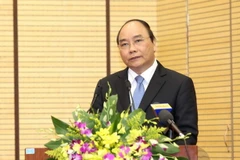 Phó Thủ tướng Nguyễn Xuân Phúc phát biểu tại hội nghị. (Ảnh: An Đăng/TTXVN)