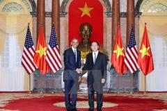 Chủ tịch nước Trần Đại Quang và Tổng thống Hoa Kỳ Barack Obama. (Ảnh: Nhan Sáng/TTXVN)