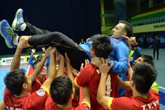 Niềm vui của đội tuyển futsal Việt Namsau khi giành vé dự World Cup. (Nguồn: AFC)