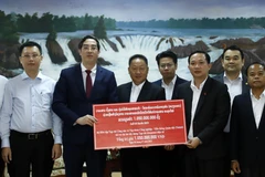 Việt Nam giúp Tạp chí AlounMai của Lào xây dựng phiên bản điện tử 