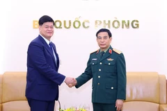 Bộ trưởng Bộ Quốc phòng Phan Văn Giang tiếp Thứ trưởng Bộ Quốc phòng Philippines Irineo Cruz Espino. (Ảnh: Văn Điệp/TTXVN)