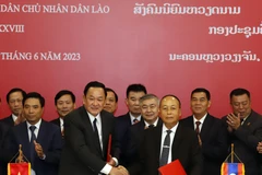 Việt Nam-Lào tăng cường hợp tác tìm kiếm, quy tập hài cốt liệt sỹ