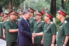 Tổng Bí thư, Chủ tịch nước Tô Lâm với Lãnh đạo Bộ Quốc phòng và Học viện Quốc phòng. (Ảnh: Lâm Khánh/TTXVN)