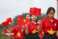 Học sinh trong ngày khai giảng năm học mới. (Ảnh: TTXVN)