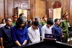 Các bị cáo nghe tuyên án ngày 22/11/2019. (Ảnh: Thành Chung/TTXVN)