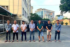 Bảy đối tượng trong băng cướp bị bắt. (Ảnh: TTXVN phát)