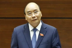 Thủ tướng Nguyễn Xuân Phúc trả lời chất vấn của đại biểu Quốc hội. (Ảnh: Thống Nhất/TTXVN)