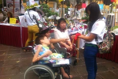 Luật sư giỏi với nhận thức và thái độ đúng đắn đối với người khuyết tật sẽ giúp họ hòa nhập với xã hội. (Ảnh minh họa: Hồng Kiều/Vietnam+)