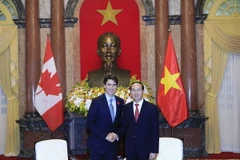 Chủ tịch nước Trần Đại Quang tiếp Thủ tướng Canada Justin Trudeau. (Ảnh: Nhan Sáng/TTXVN)