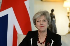 Thủ tướng Anh Theresa May phát biểu tại một hội nghị ở London. (Nguồn: AFP/TTXVN)