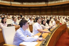 Chiều nay, Quốc hội đã chính thức Thông qua dự thảo Nghị quyết về phê chuẩn quyết toán ngân sách nhà nước 2022. (Ảnh: TTXVN)